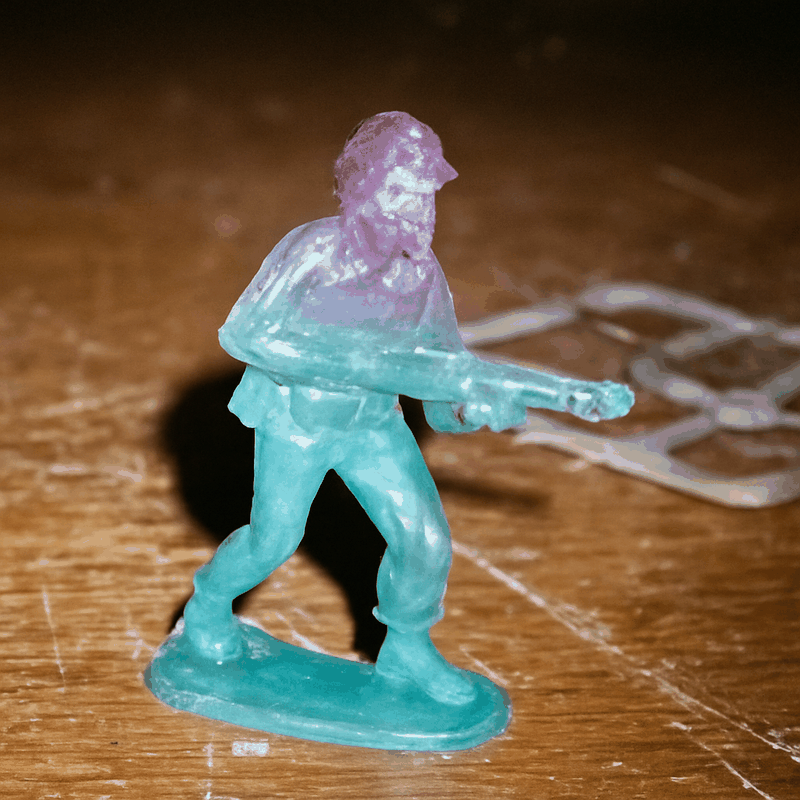 SOLDER toy soldier, molded teal to purple